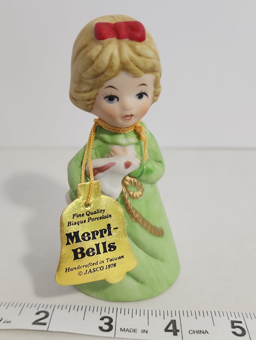 1978 Merri-Bells Green Porcelain Girl Figurine with Red Bow